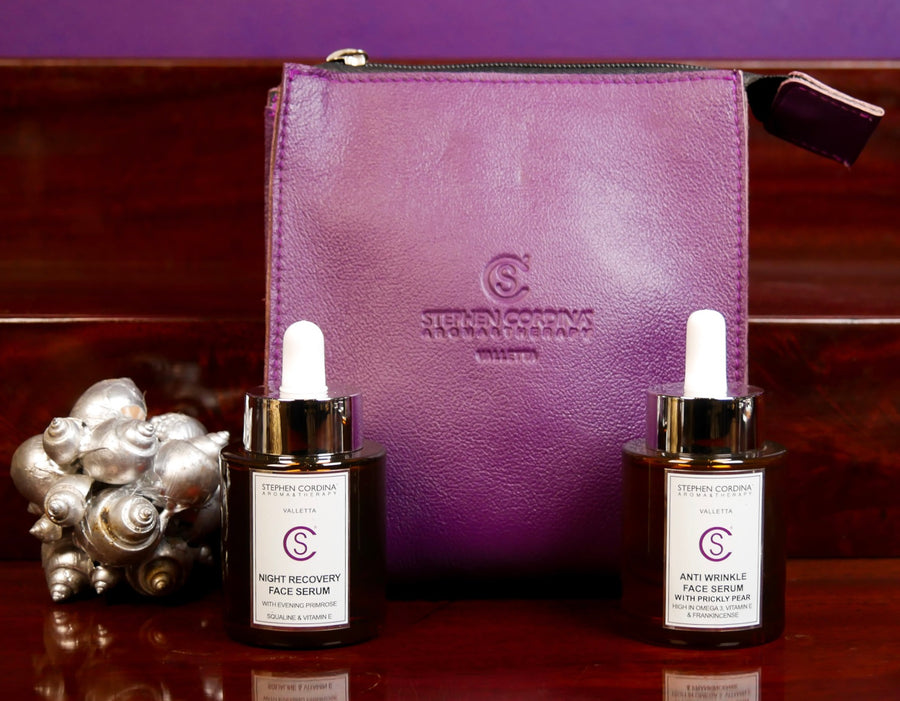 Day and Night Face serums with purple leather bag.